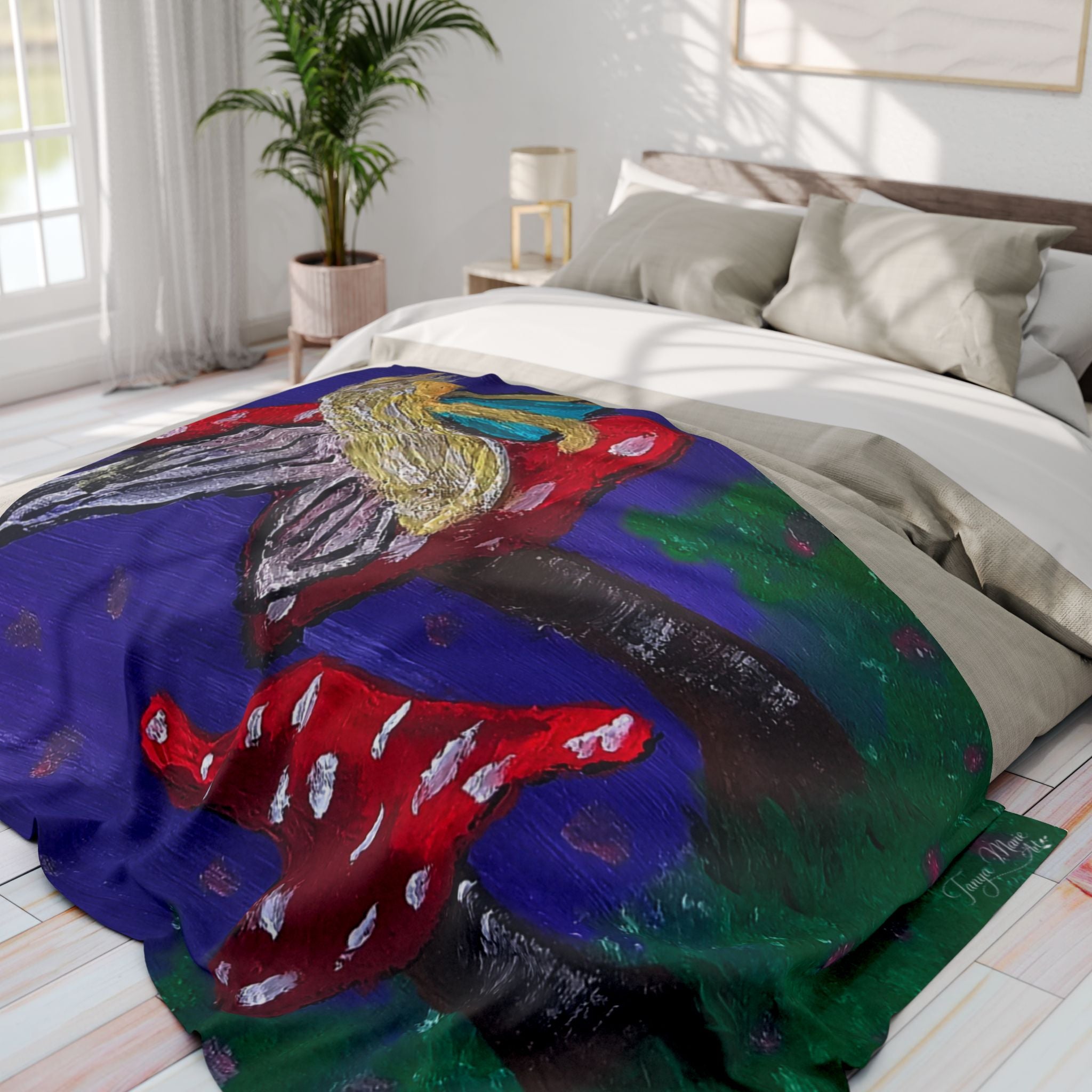 Fleece blanket with vivid mushroom-and-fairy scene artwork, purple base with red and green
