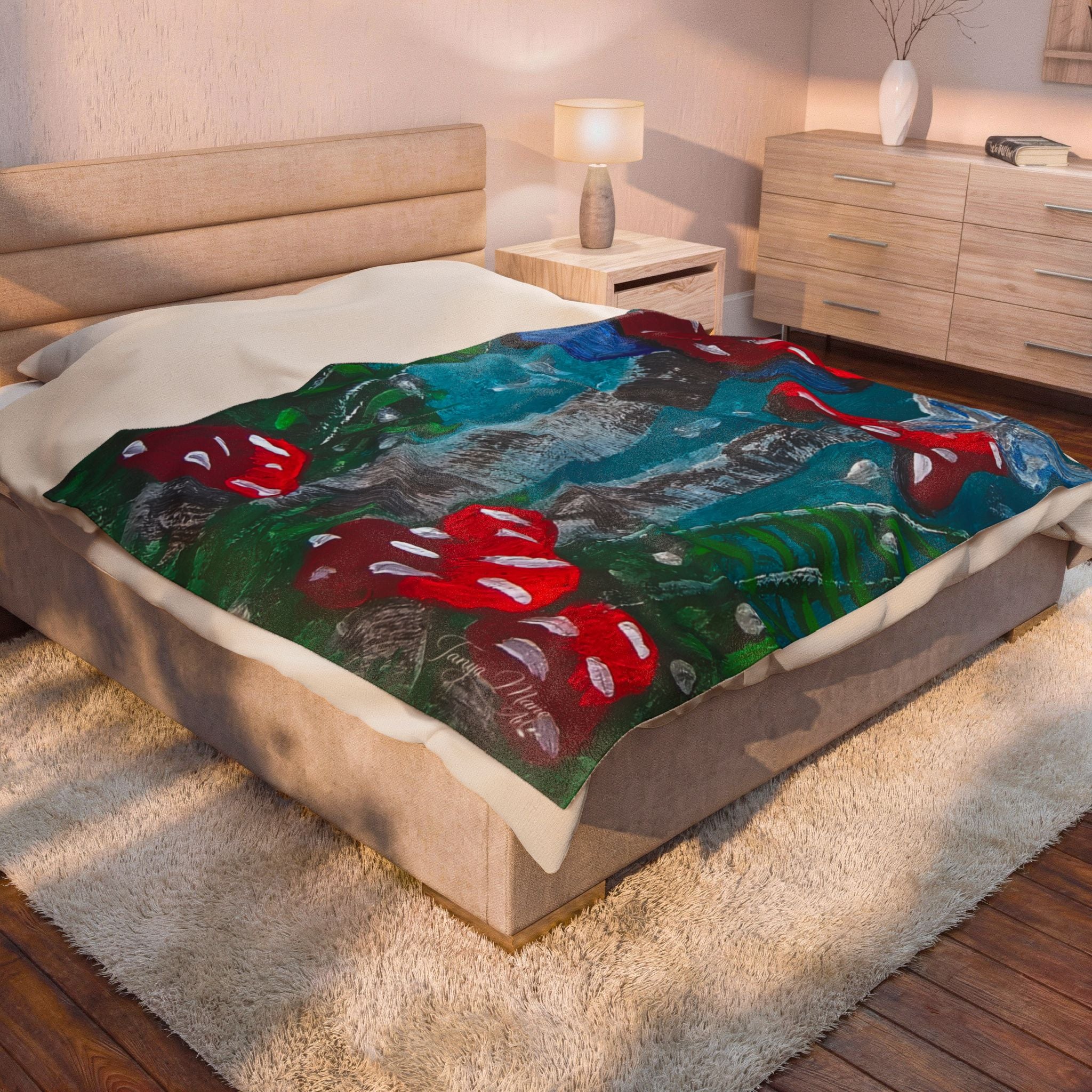 Velveteen plush throw blanket with colorful mushroom scene, red caps on teal forest background