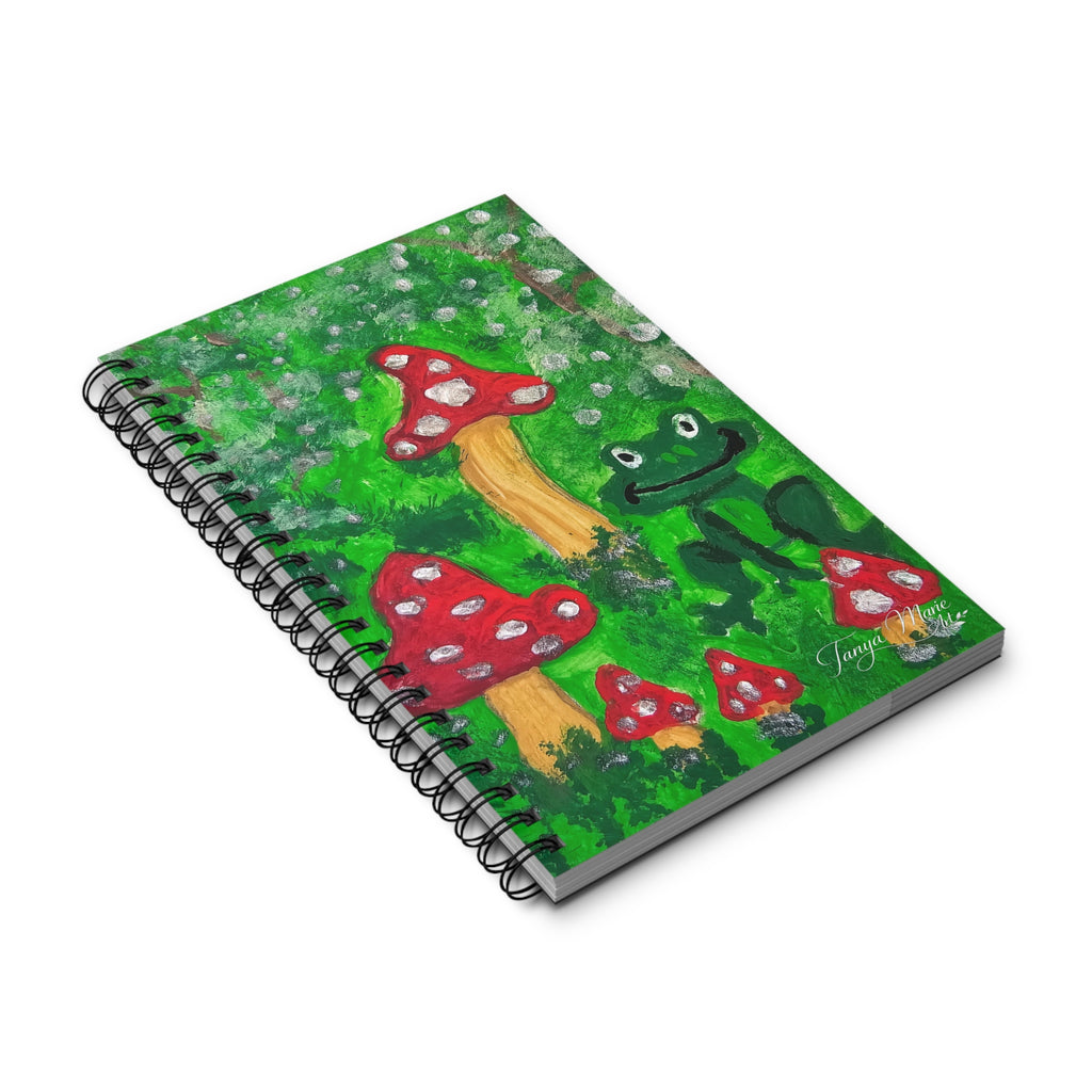 Green forest spiral notebook cover with mushrooms and frog illustration