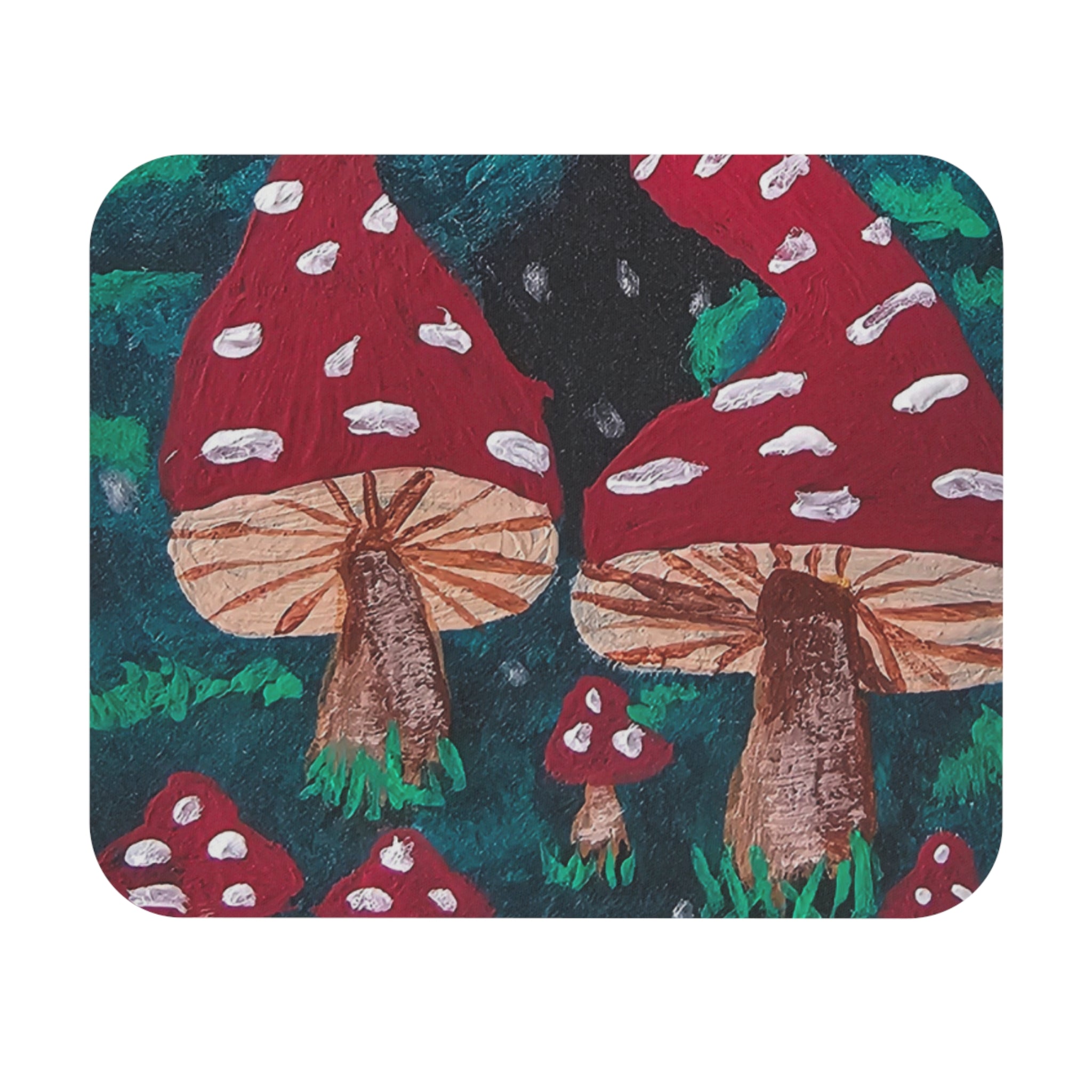 Rounded rectangle mouse pad featuring red toadstools, brown stems, and green grass accents
