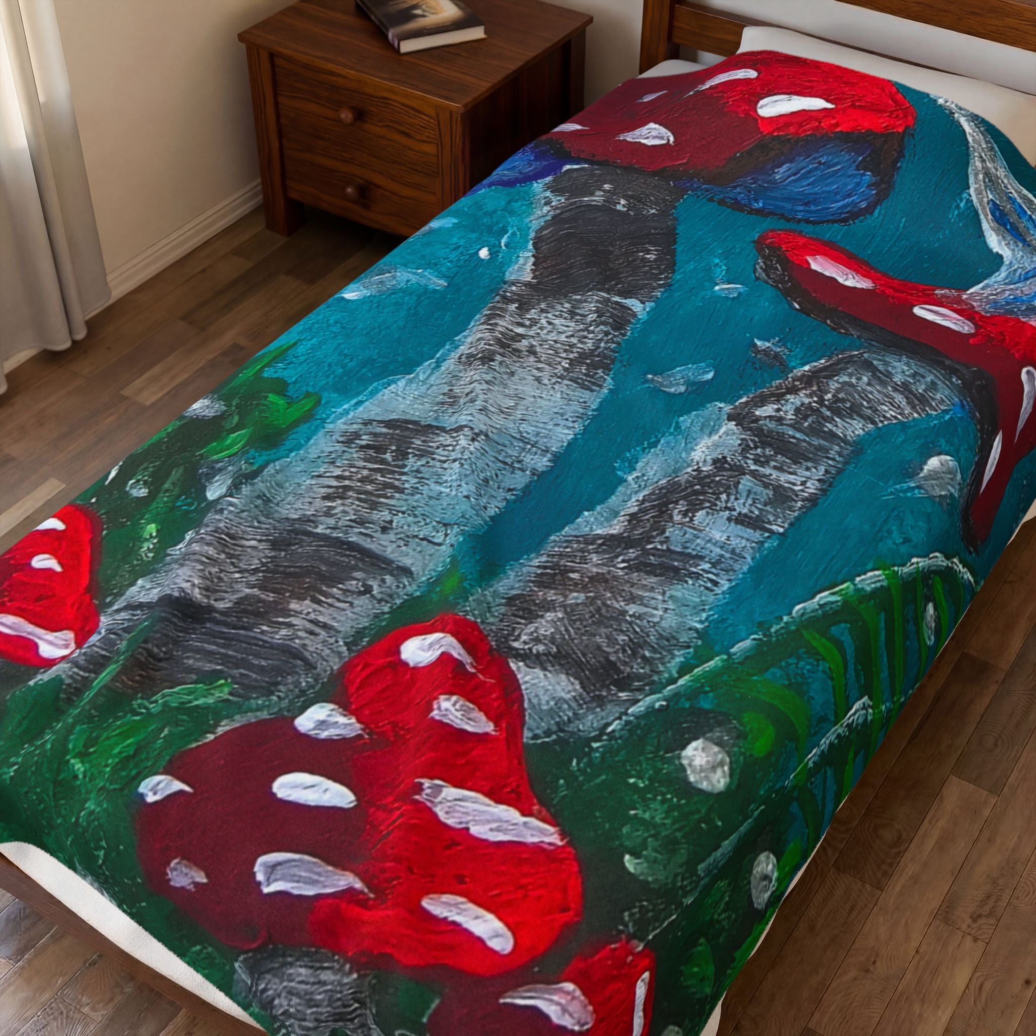 Velveteen plush throw blanket with large mushroom artwork, teal and green forest, red caps