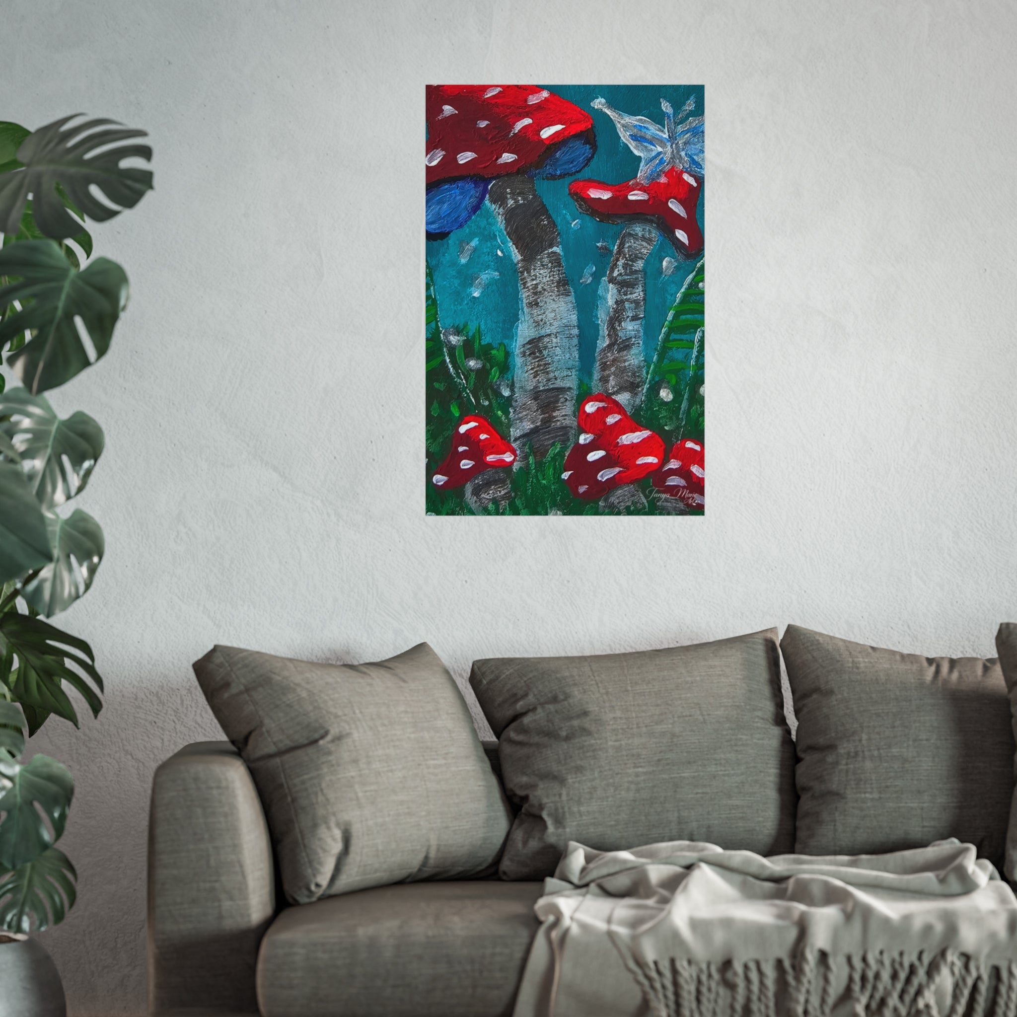 Mushroom garden wall poster with red toadstools and blue-green stems above a gray couch