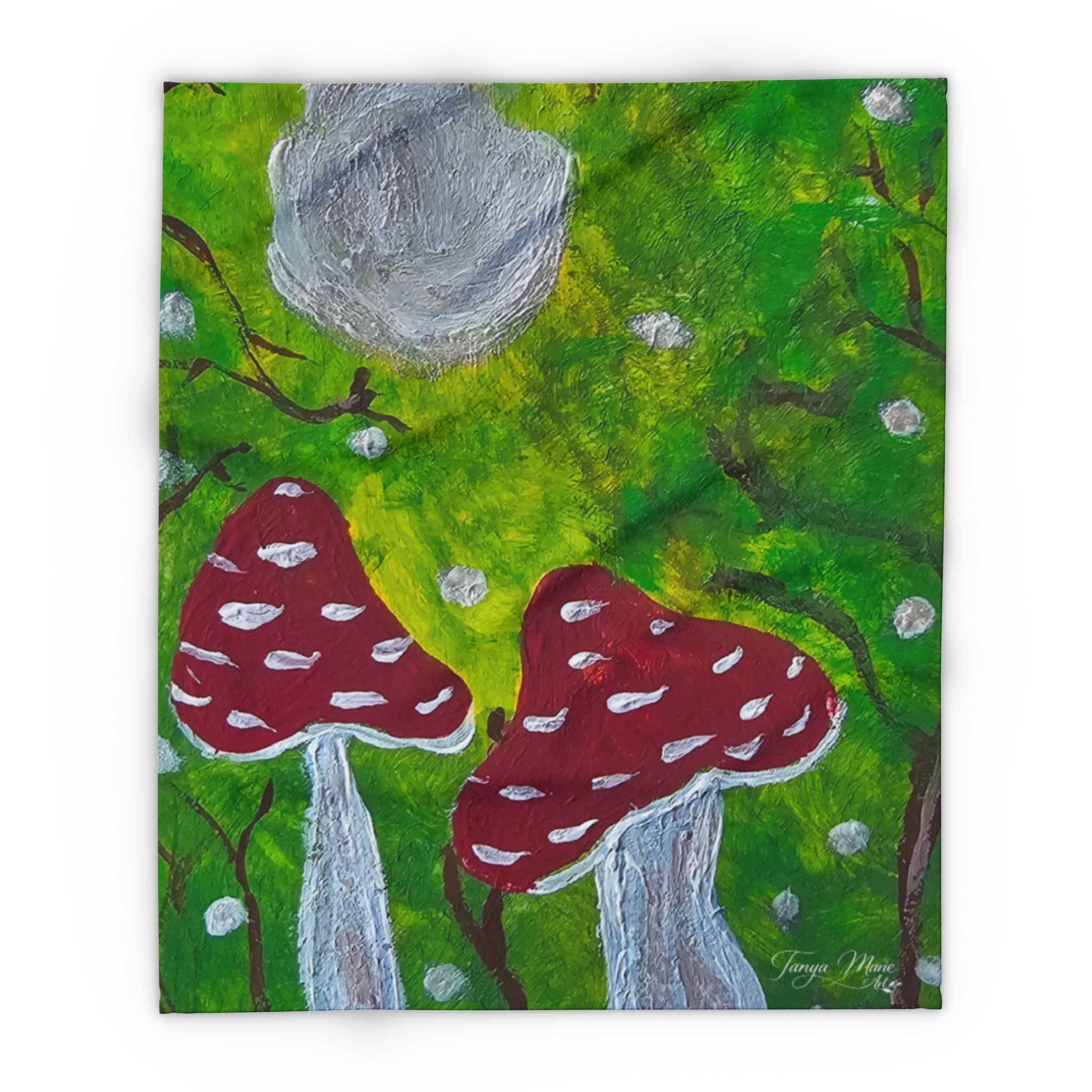 Fleece blanket featuring green forest with red mushrooms and a gray moon centerpiece