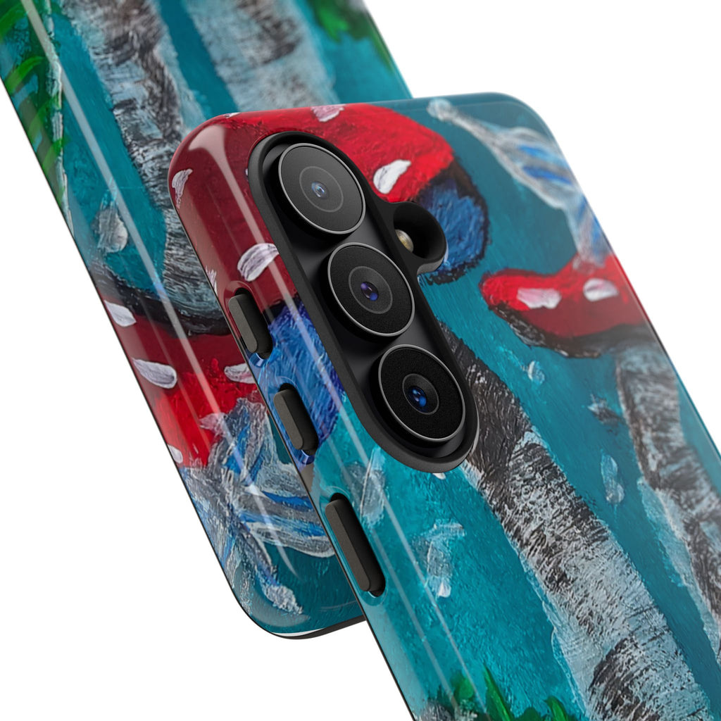 Phone case back view with red toadstools on teal/blue stripes and triple camera rings