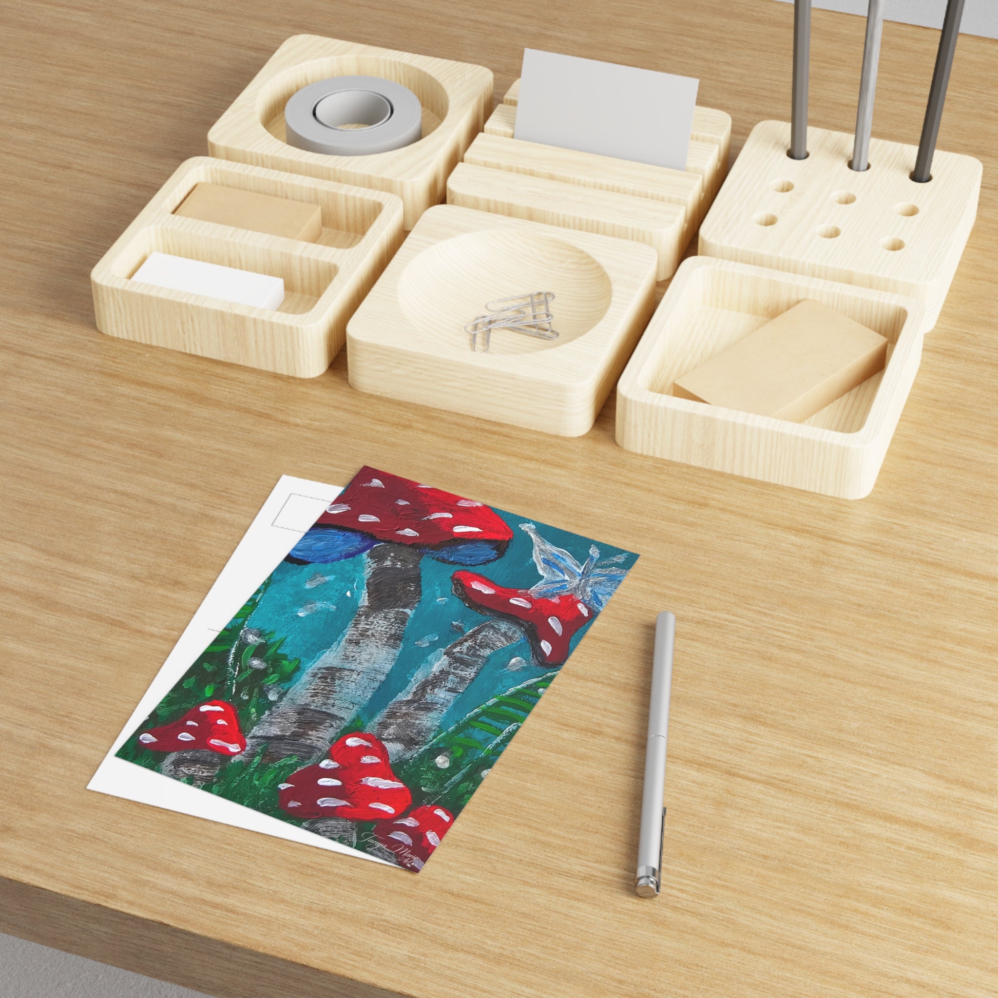 Glossy art postcard: red-and-white mushrooms on teal blue path, dark trunks