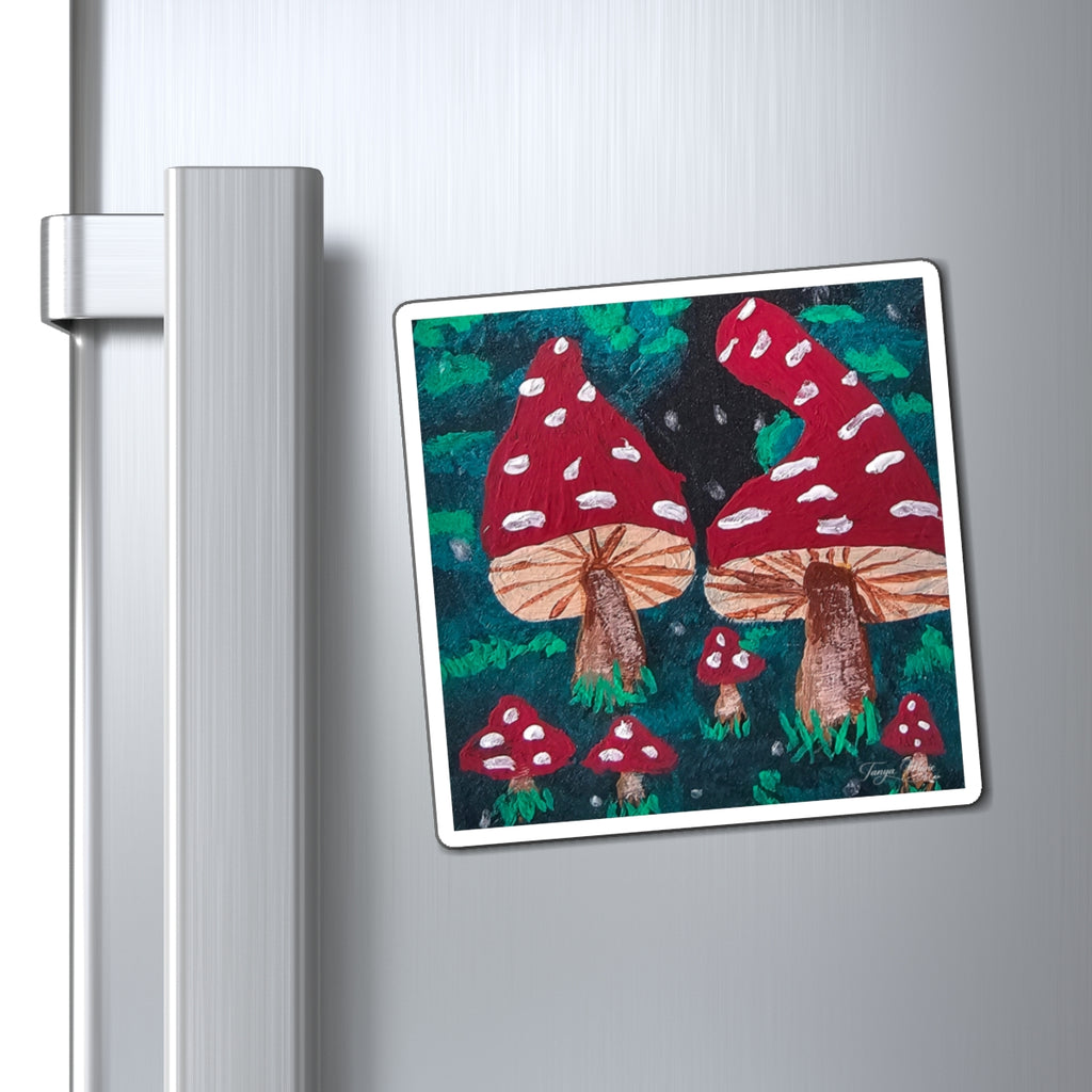 White-framed toadstool painting refrigerator magnet with red mushrooms and white speckles on green