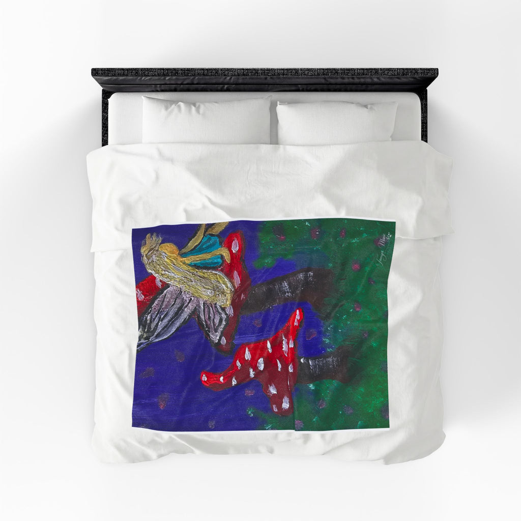Velveteen blanket plush throw laid on bed, fairy artwork panel centered on white fabric
