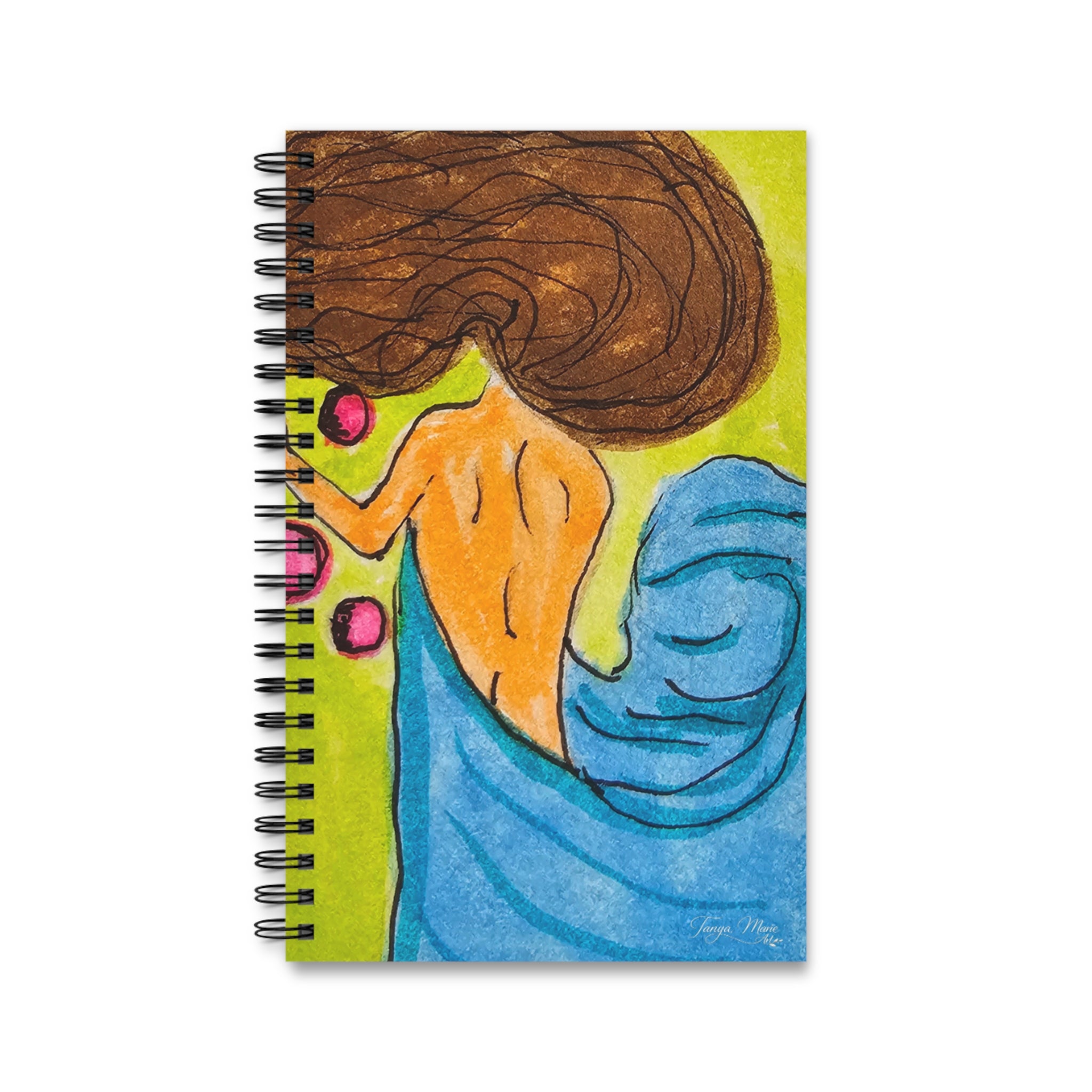 Spiral-bound fantasy journal with watercolor cover of a witchy face in orange and blue