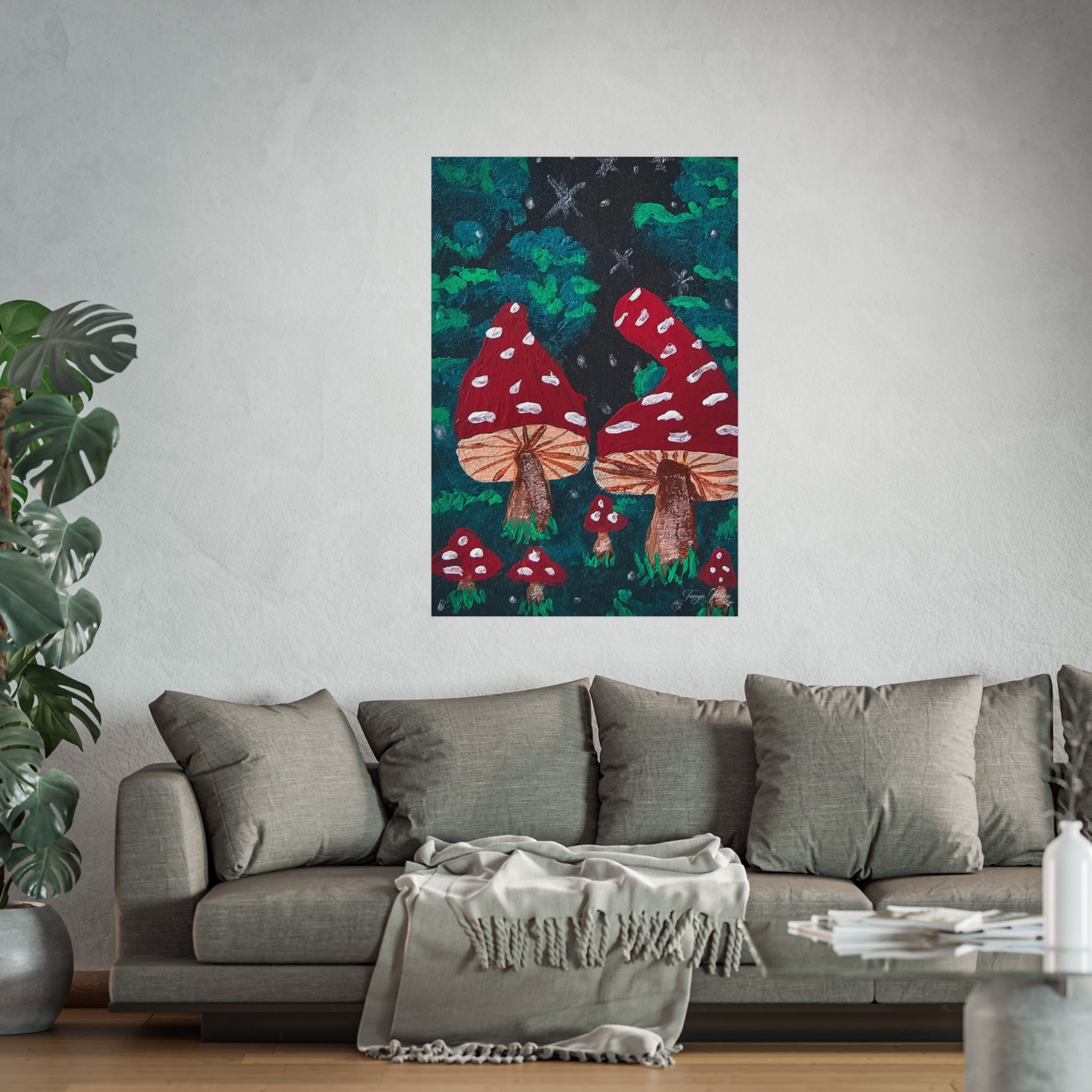 Matte fine art poster with red spotted toadstools on a dark green forest background