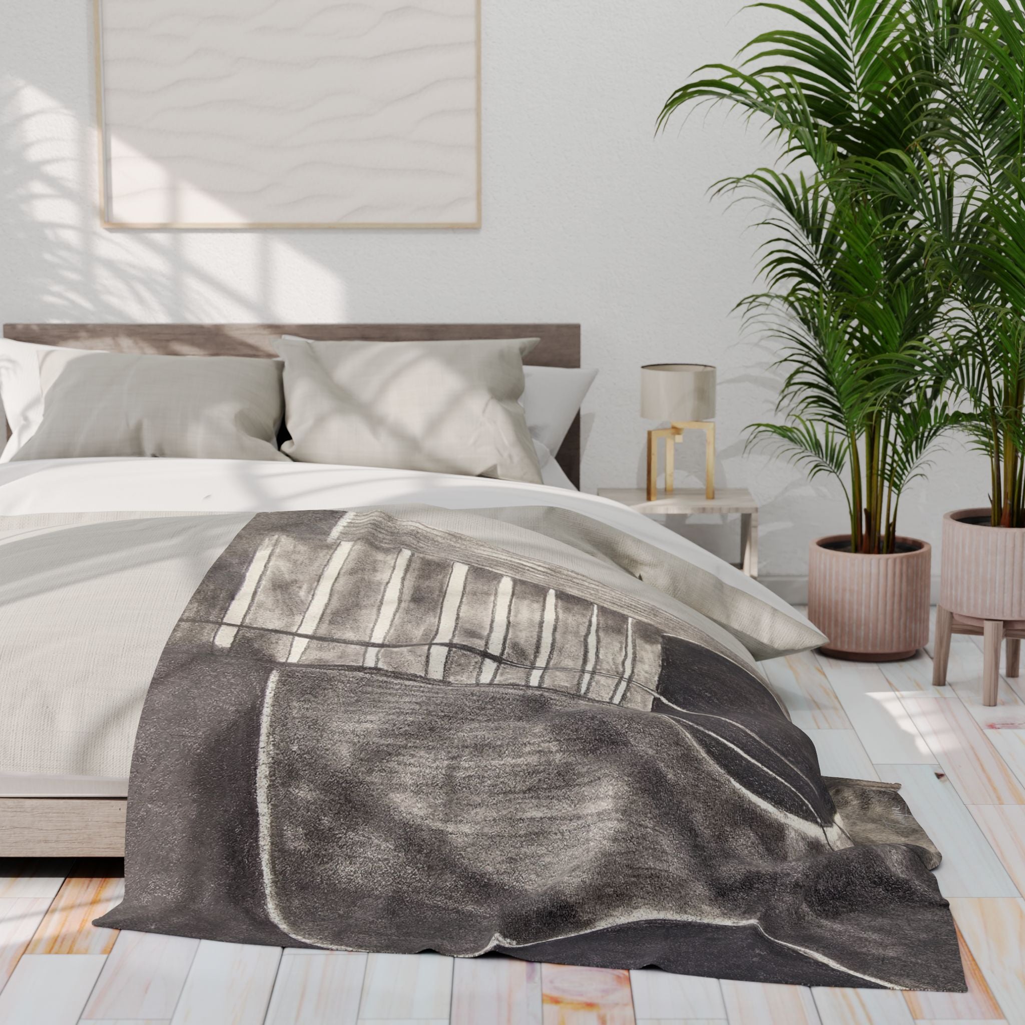 Gray fleece blanket on bed, featuring acoustic guitar line art