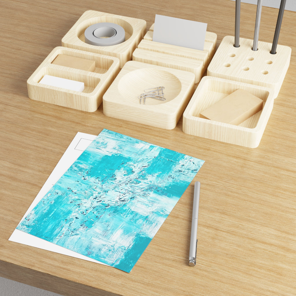 Turquoise abstract note cards set shown in light wood organizer with one card visible