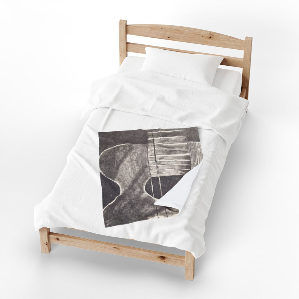 Plush blanket with centered acoustic guitar sketch graphic in dark gray on white
