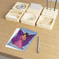 Purple fairy illustration postcard with pink dress and wings on blue background