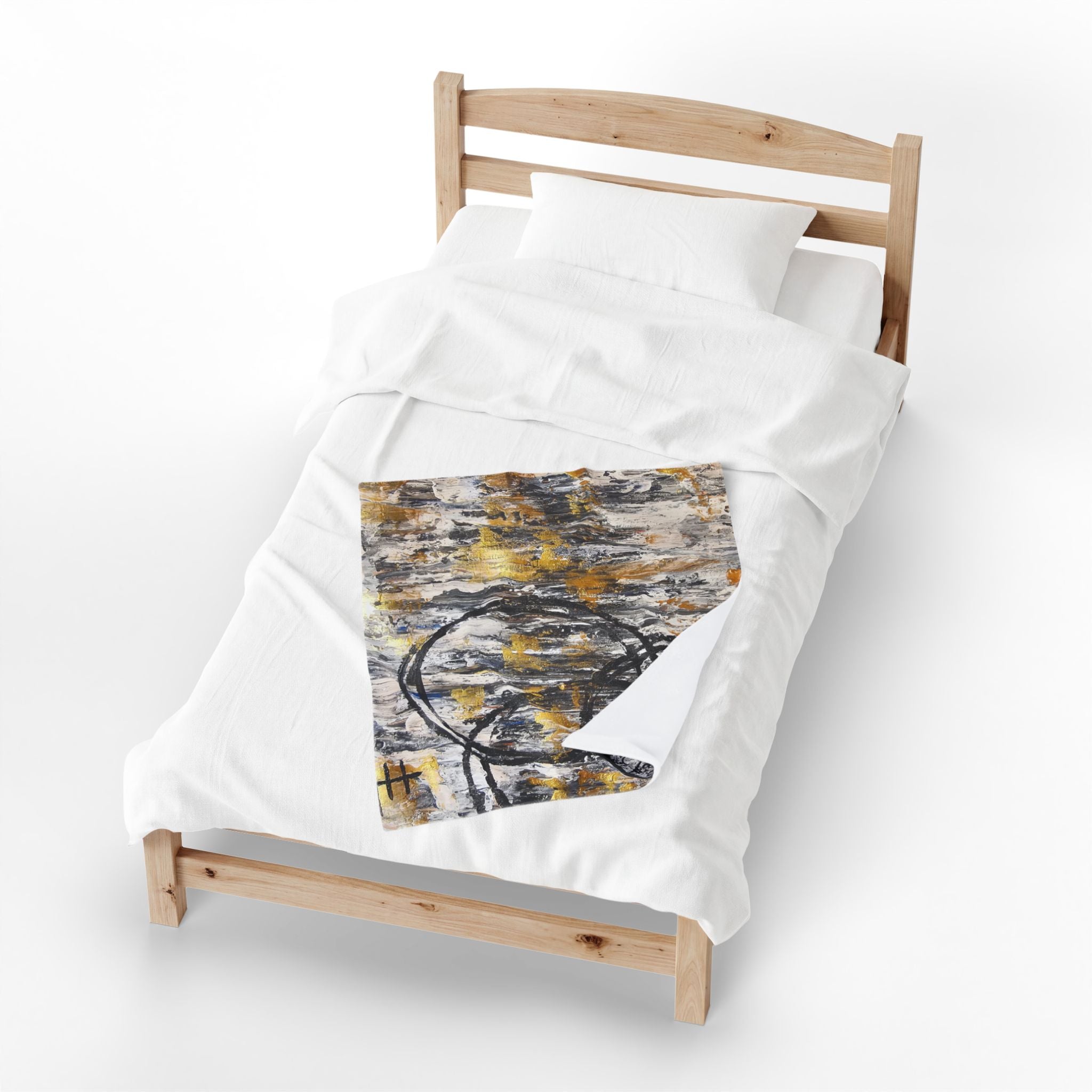 Velveteen plush blanket with abstract gold and charcoal circle pattern on white
