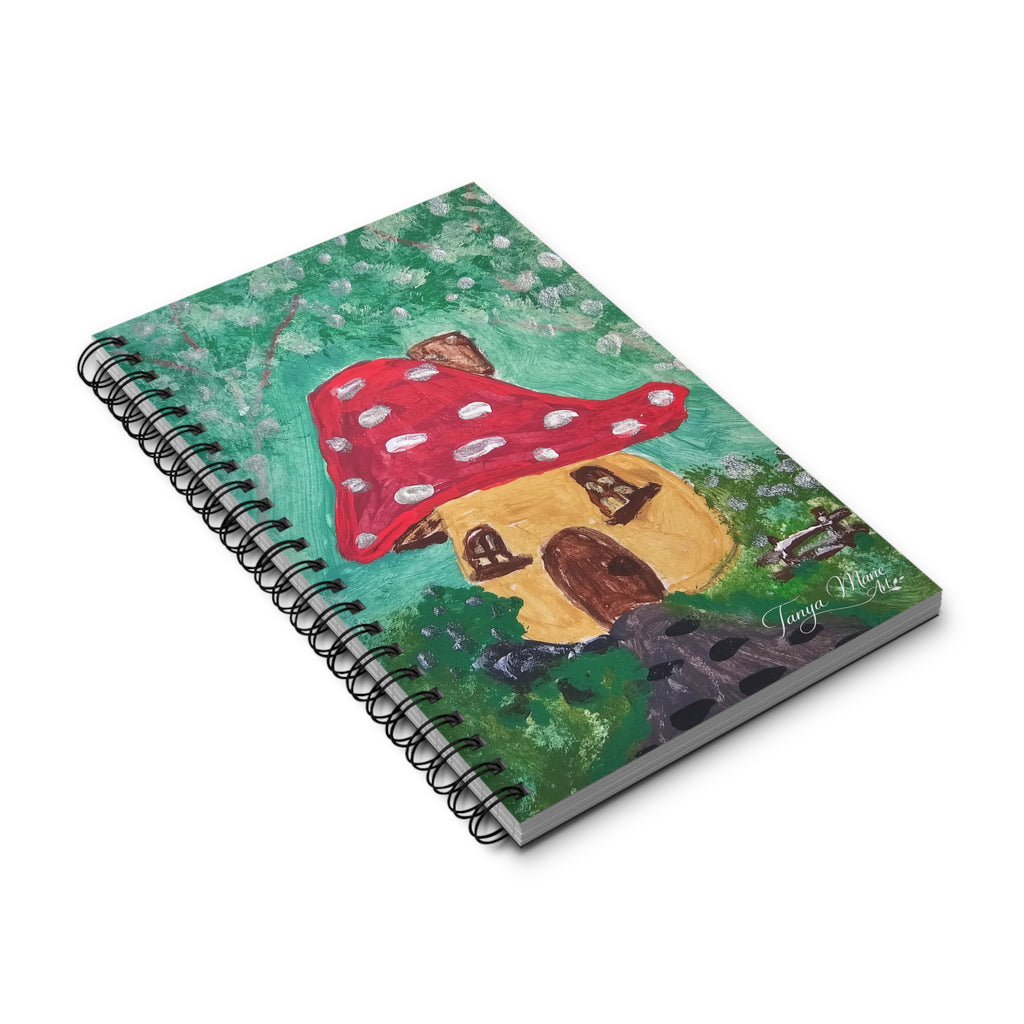 Spiral journal notebook with mushroom cottage cover, angled view with black binding.