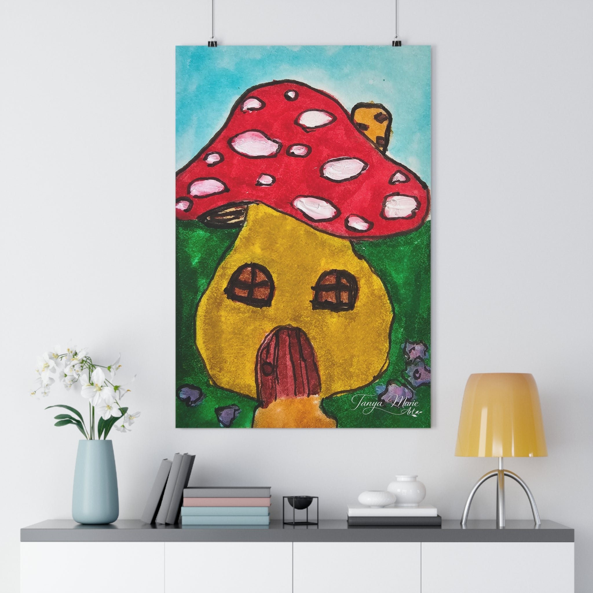 Mushroom cottage wall art print with red polka-dot cap, yellow house, and small purple mice