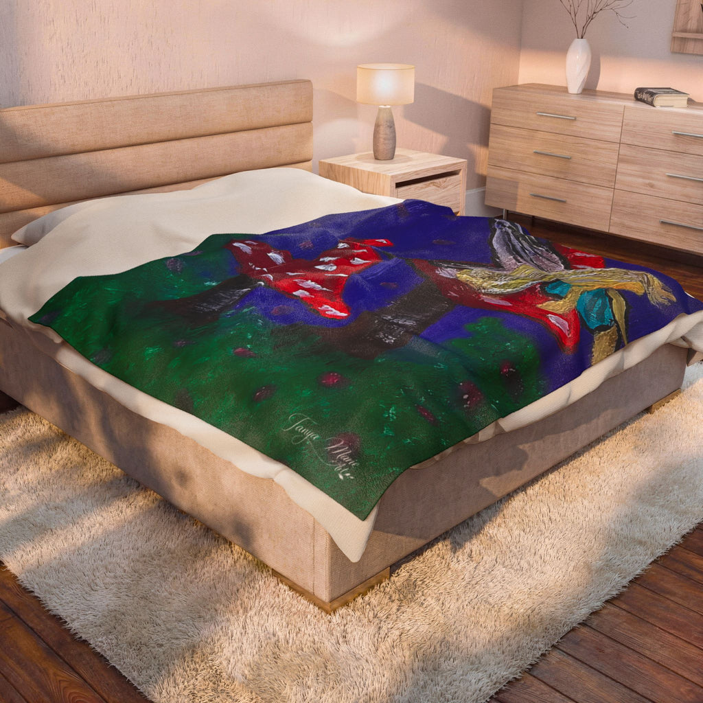 Plush velveteen blanket with colorful fairy, red mushrooms, and dark woodland scene