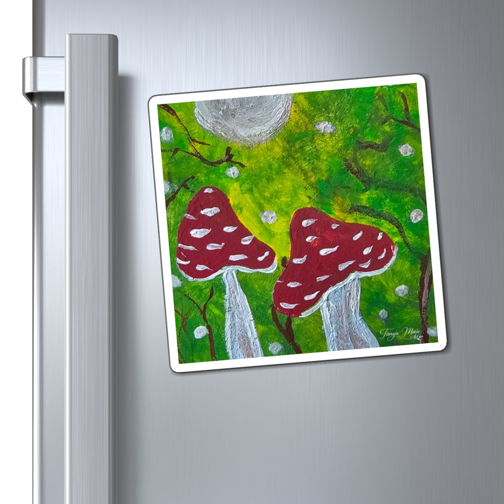 Hand-painted toadstool magnet on a fridge with red mushrooms, white spots, and gray moon