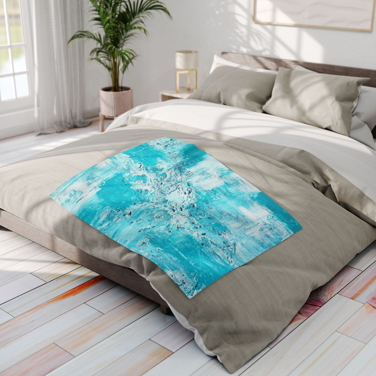 Turquoise abstract fleece blanket on bed, splash-streak pattern rectangle