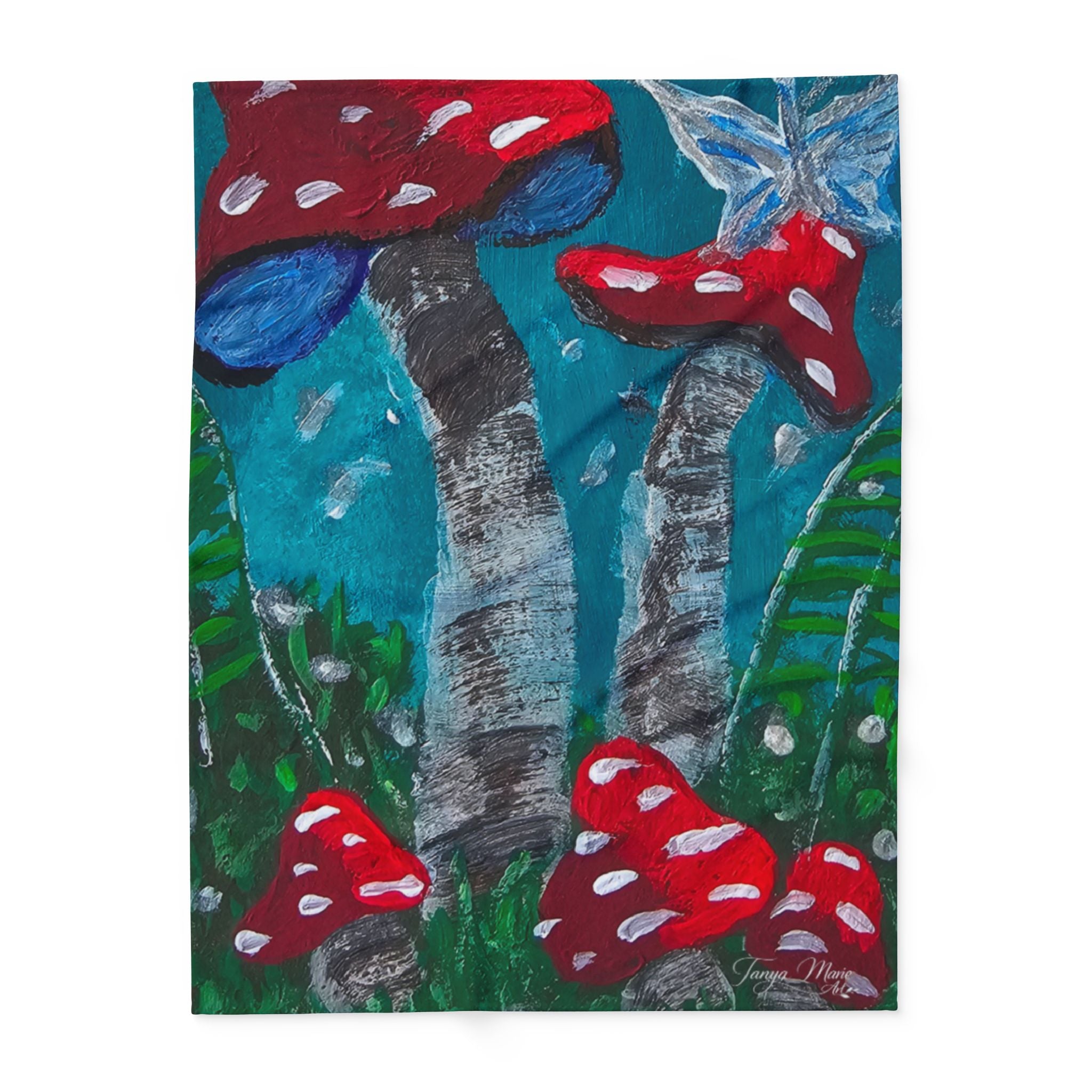 Fleece blanket front featuring red mushroom caps over teal, green, and gray vertical trunks