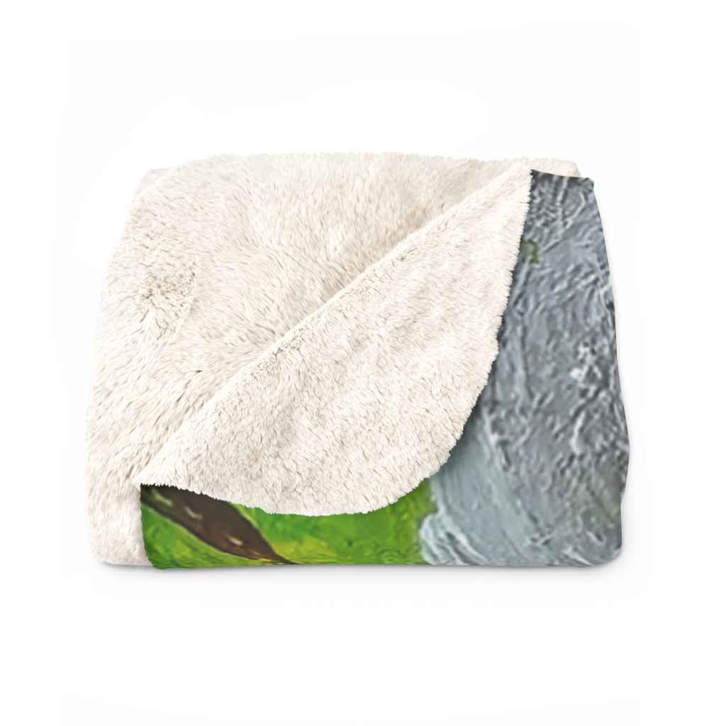 Sherpa blanket with off-white sherpa fleece face and gray fabric reverse, folded