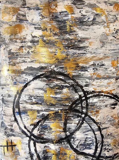 Close-up abstract art print with gold flecks, gray texture, and thick black ring lines